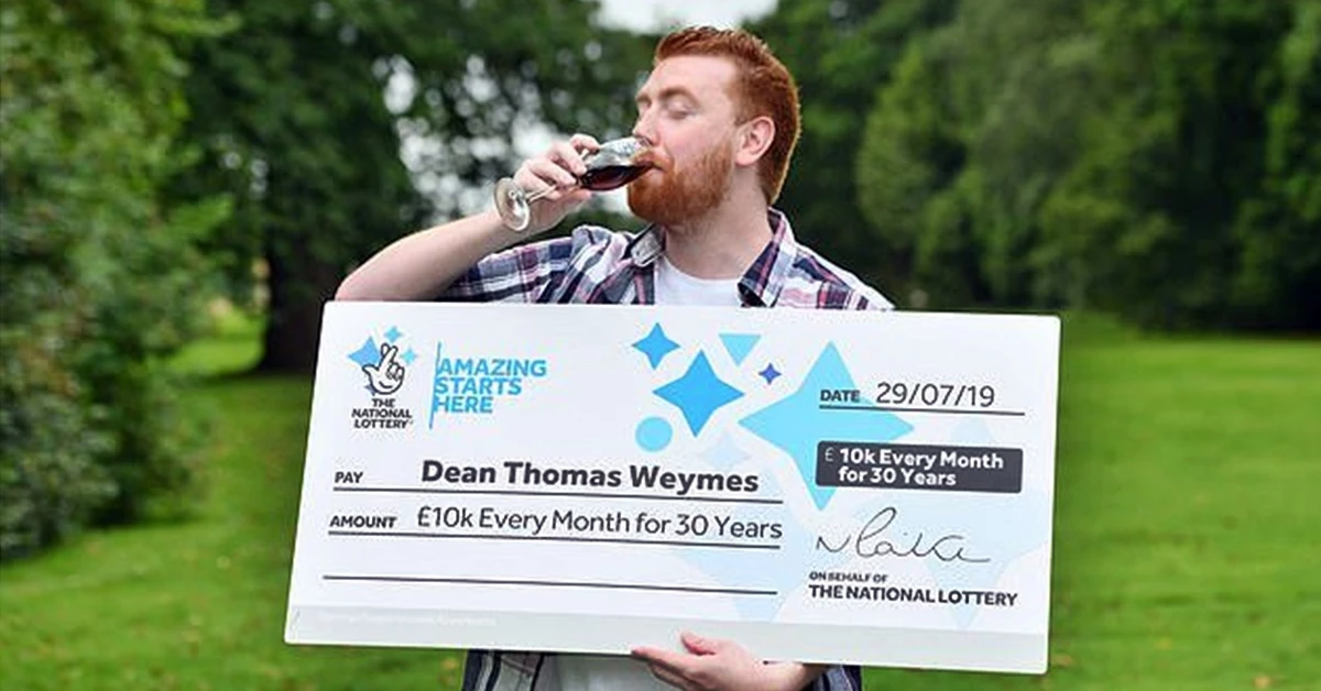 코카콜라를 마시며 복권 당첨을 자축하는 딘 웨이메스. /영국국립복권