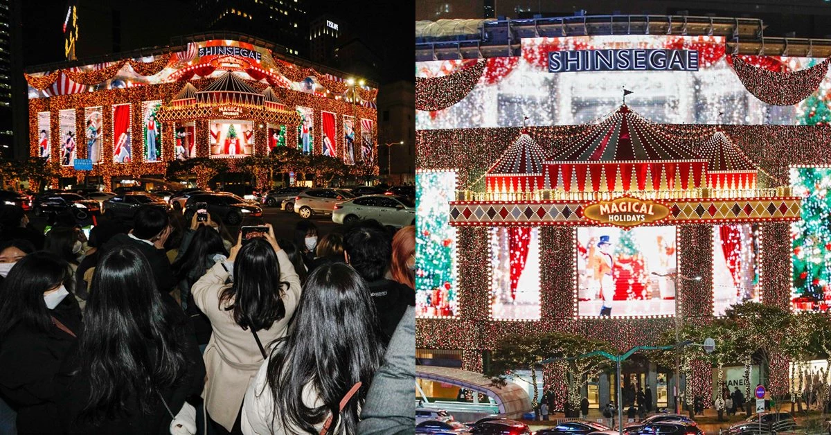 성탄절을 이틀 앞둔 23일 오후 퇴근길 시민들이 서울 중구 신세계백화점 본점 외벽에 걸린 화려한 조명을 감상하고 있다. /뉴스1