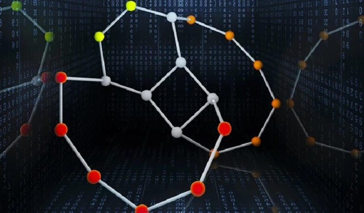 리드버그 양자컴퓨터의 모식도: 양자 단열 컴퓨팅을 위해 초고진공 공간에 5-10 마이크로미터의 간격으로 리드버그 원자들이 배열된다. 20개의 리드버그 원자들이 데이터 큐비트(백색 꼭지점)과 보조 양자선 큐비트(유색 꼭지점)로 구성된 쿠라토프스키 그래프 K(3:3)를 구현하고 있다.