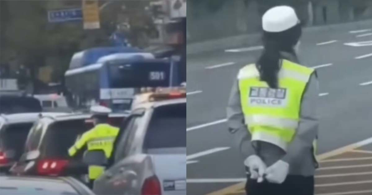 교통정리를 하는 남성 경찰의 옆에서 뒷짐을 지고 있는 여성 경찰의 모습을 담은 영상이 공개돼 논란이 일고 있다. 사진은 ‘KNN 뉴스’ 유튜브 채널에 올라온 영상을 캡처한 것이다.