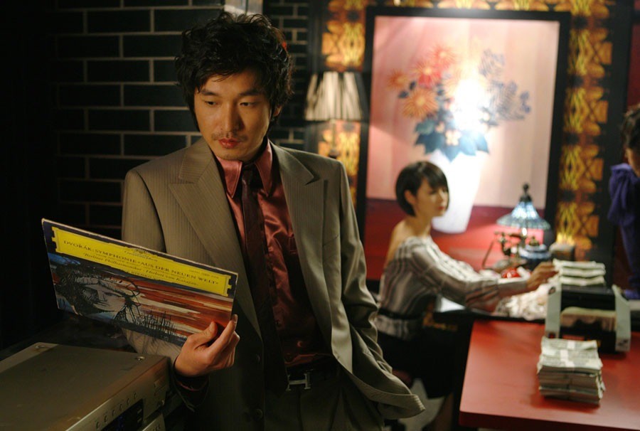 '타짜' 1편 주연 배우 조승우와 김혜수 / CJ ENM