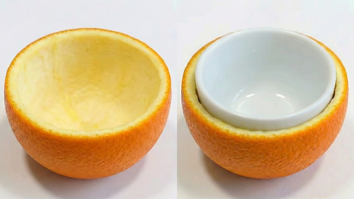 AI 툴로 생성한 자료사진. 귤 윗부분을 자르고 과육만 파낸다. 속이 비워진 귤껍질 2개를 만든다. 둘 중 하나를 뒤집어 다른 껍질 안에 겹쳐 넣는다. 여기에 실제 찻잔을 안쪽에 넣어 틀처럼 모양을 잡아준다. 통풍이 잘 되는 곳에서 하루 이상 충분히 건조한다.