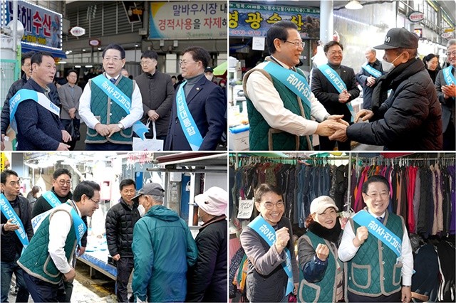 김영록 전라남도지사가 22일 지역 전통시장인 광주 말바우시장을 방문, 물품을 구매하며 상인들을 격려하고 있다.