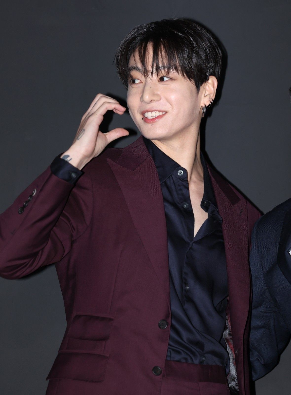 Jung Kook Posing for a Photo / News1