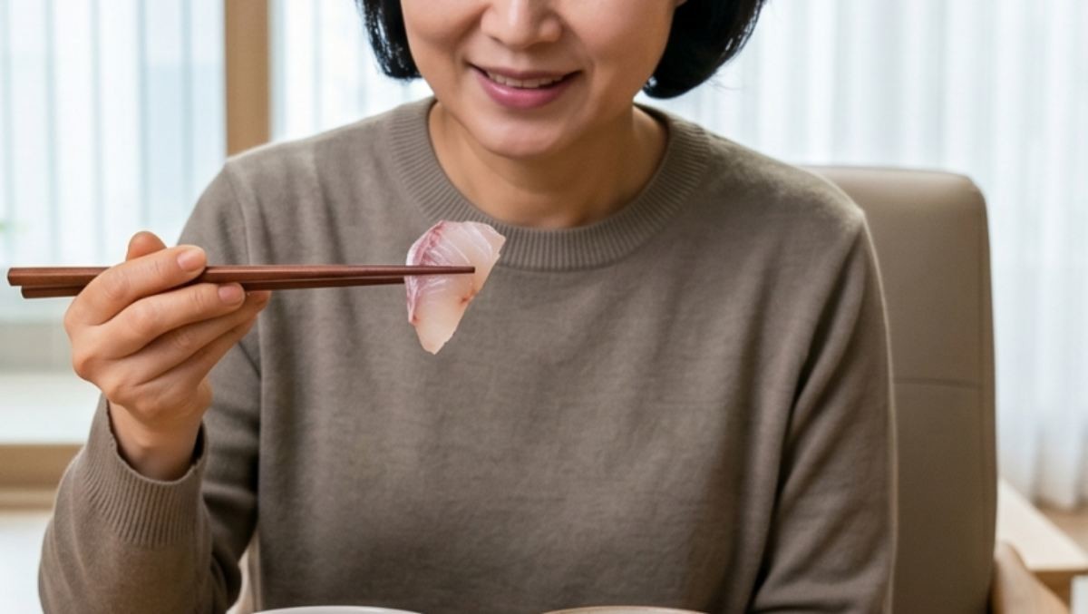 회를 먹는 사람의 모습이 담긴 자료사진. AI가 생성한 사진.