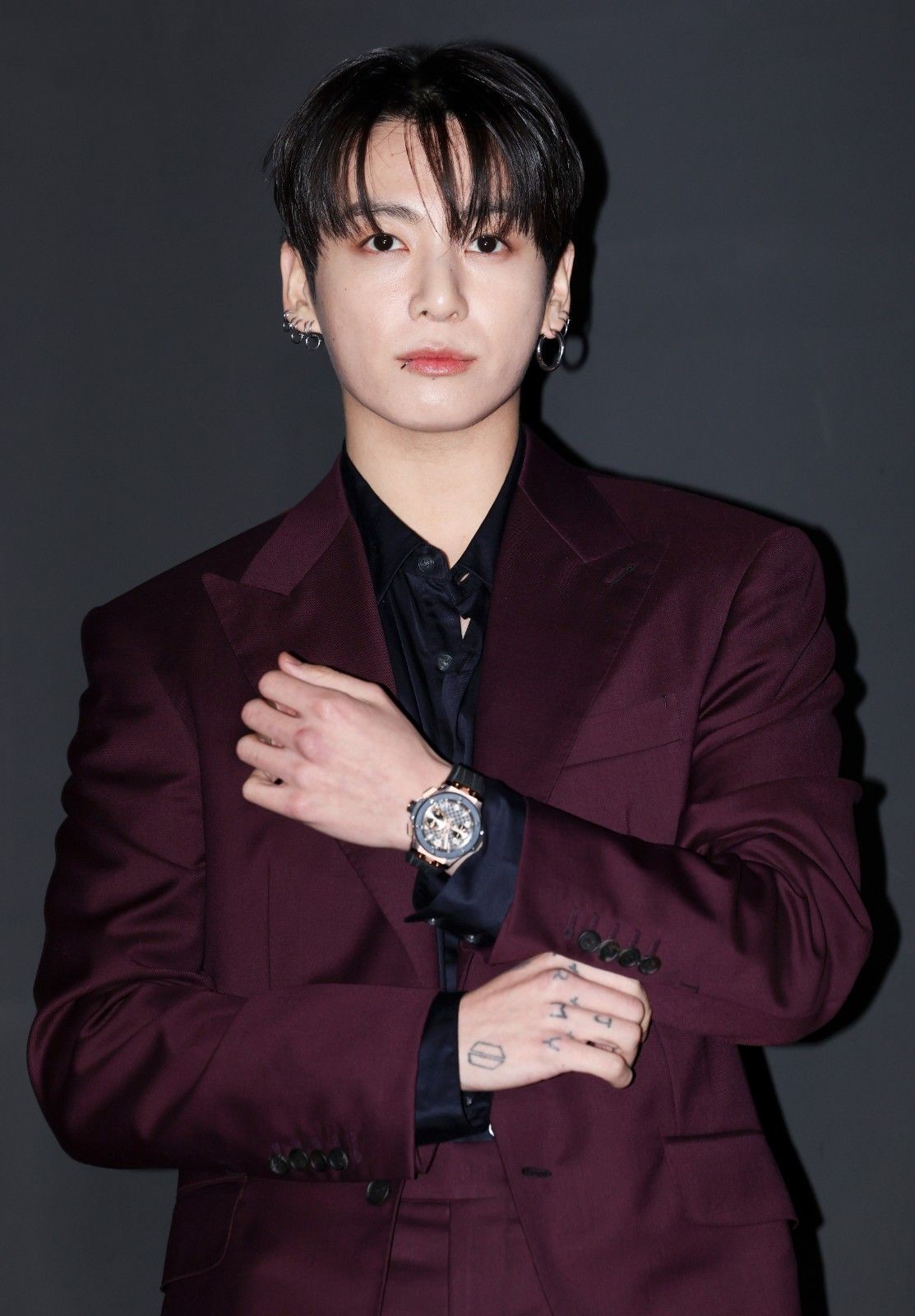 Jungkook Posing for a Photo / News1