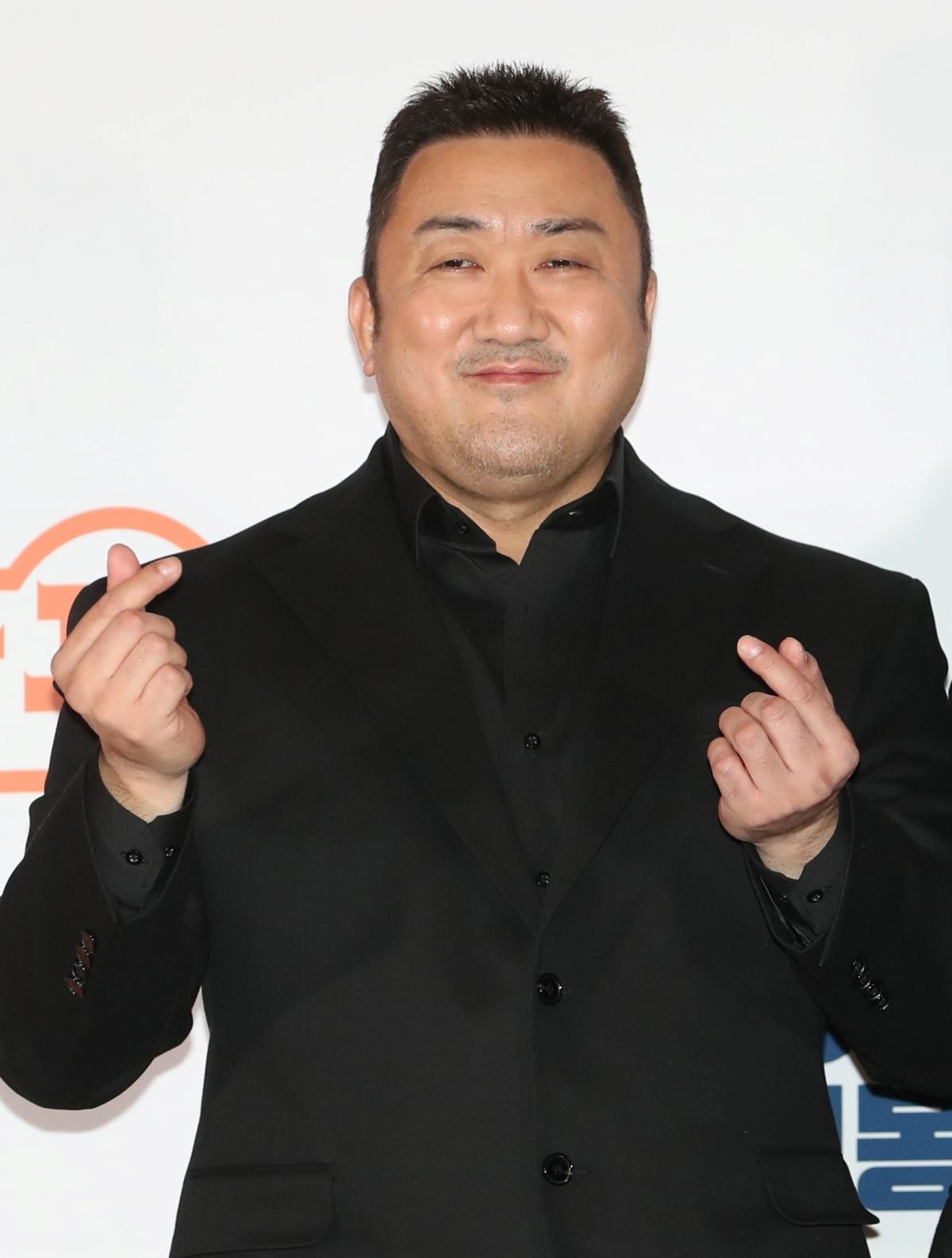예정화 남편인 배우 마동석. 코로나19로 인해 정식 결혼식을 올리기 어려워지자 2021년 먼저 혼인신고를 마쳤고, 3년 뒤인 2024년 5월 26일에야 비공개로 결혼식을 진행한 마동석과 예정화. / 뉴스1