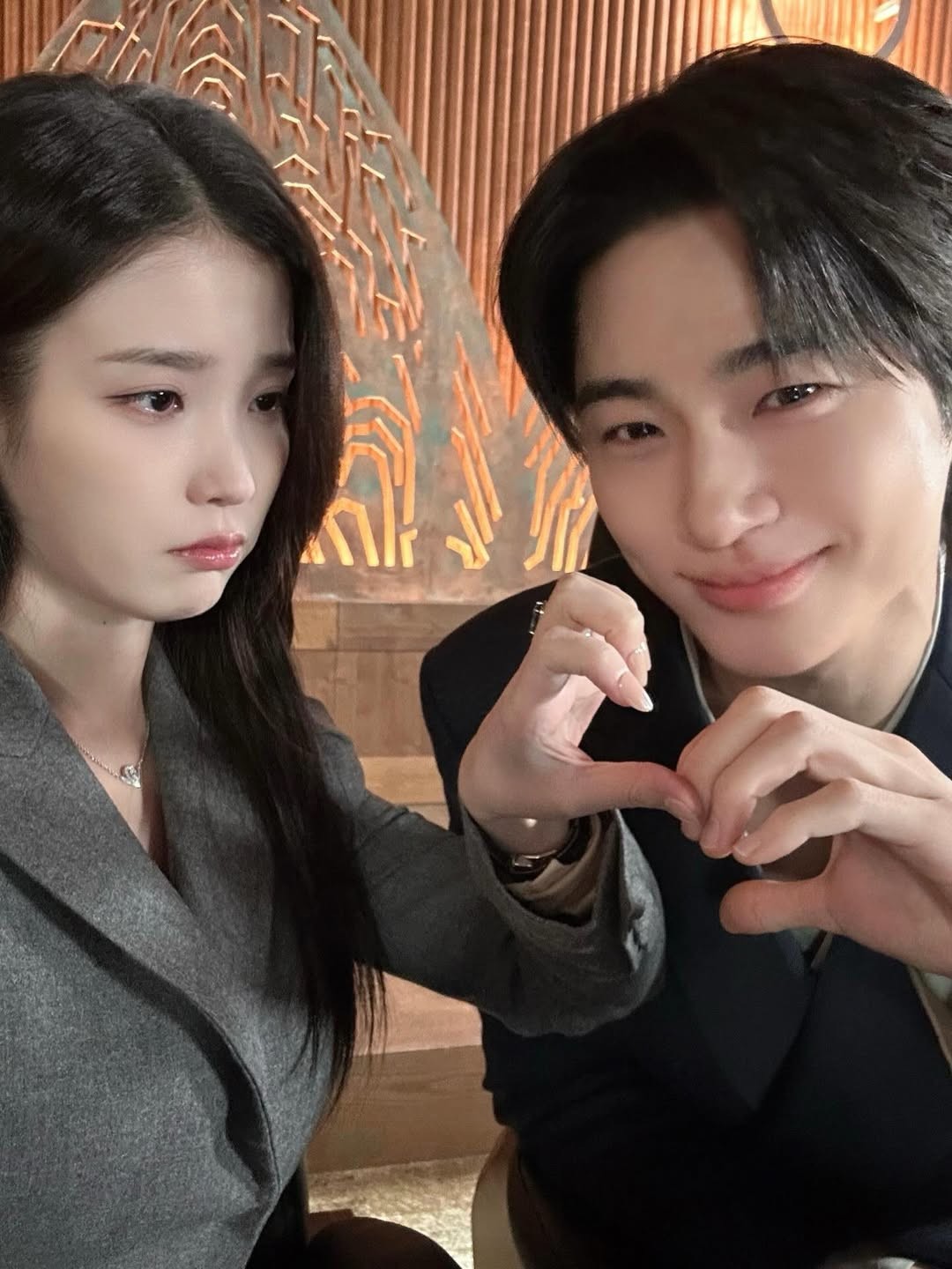 IU and Byeon Woo-seok taking selfies together / IU Instagram