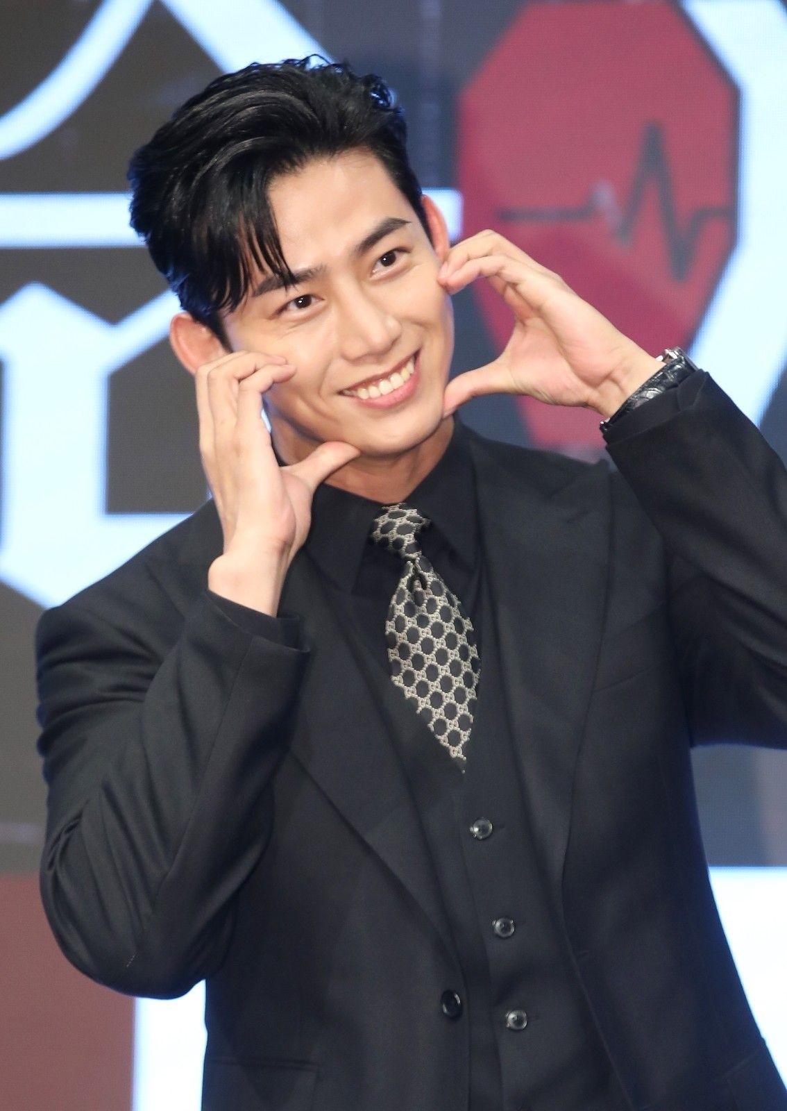 Taecyeon Posing for a Photo / News1