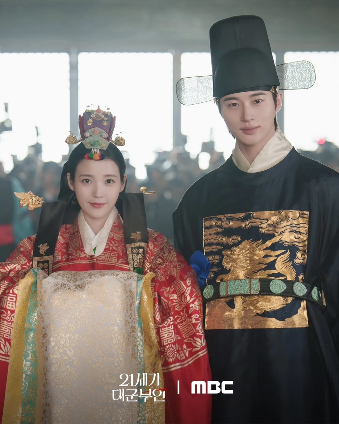 IU and Byeon Woo-seok wearing a ceremonial hanbok / MBC