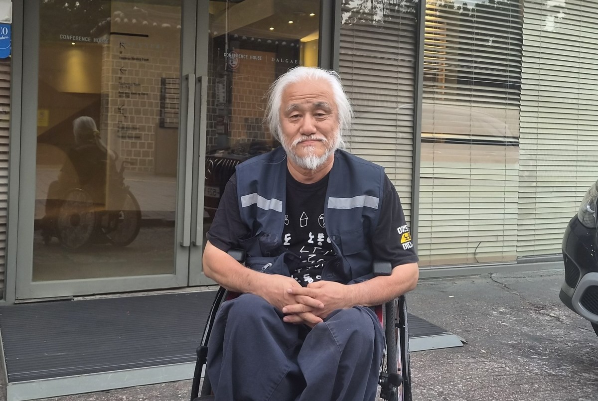 박홍근 기획예산처 장관과 면담한 박경석 전장연 대표 / 연합뉴스