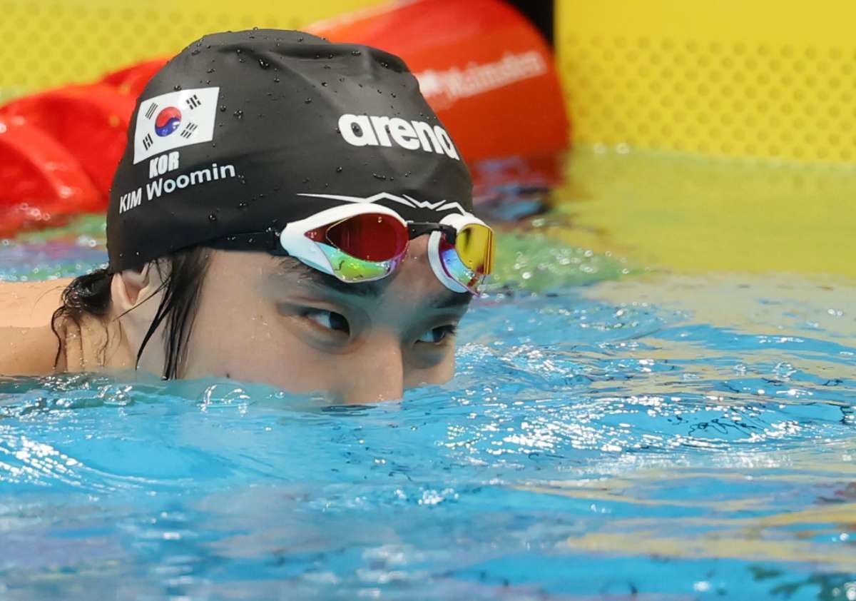 지난 22일 일본 도쿄 아쿠아틱스 센터에서 열린 2026 아이치·나고야 아시안게임 수영 남자 1500m 결승 경기를 마친 김우민이 아쉬워하고 있다. / 뉴스1